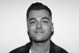 Modern short textured men’s haircut by Eddine Belaid – Clean fade and professional grooming in Switzerland