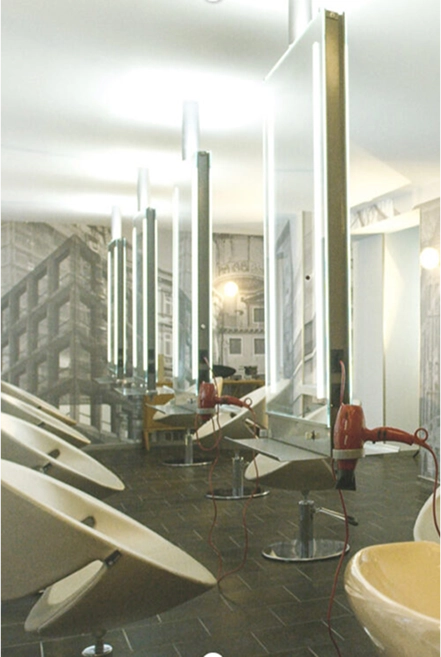 Eddine Belaid – The Color Room with modern mirrors and lighting setup for professional hair coloring and creative styling in Switzerland